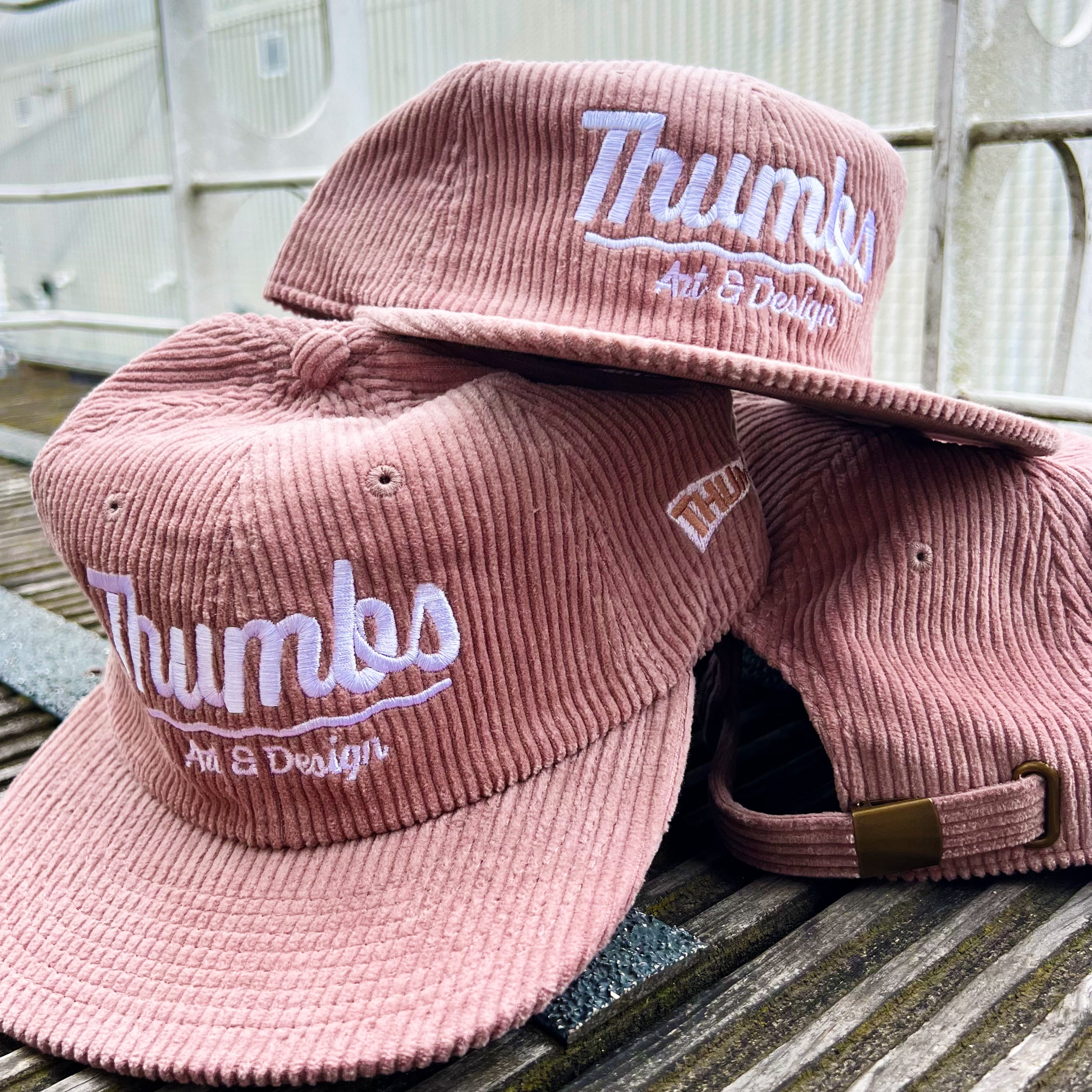 Thumbs Script Cord Cap