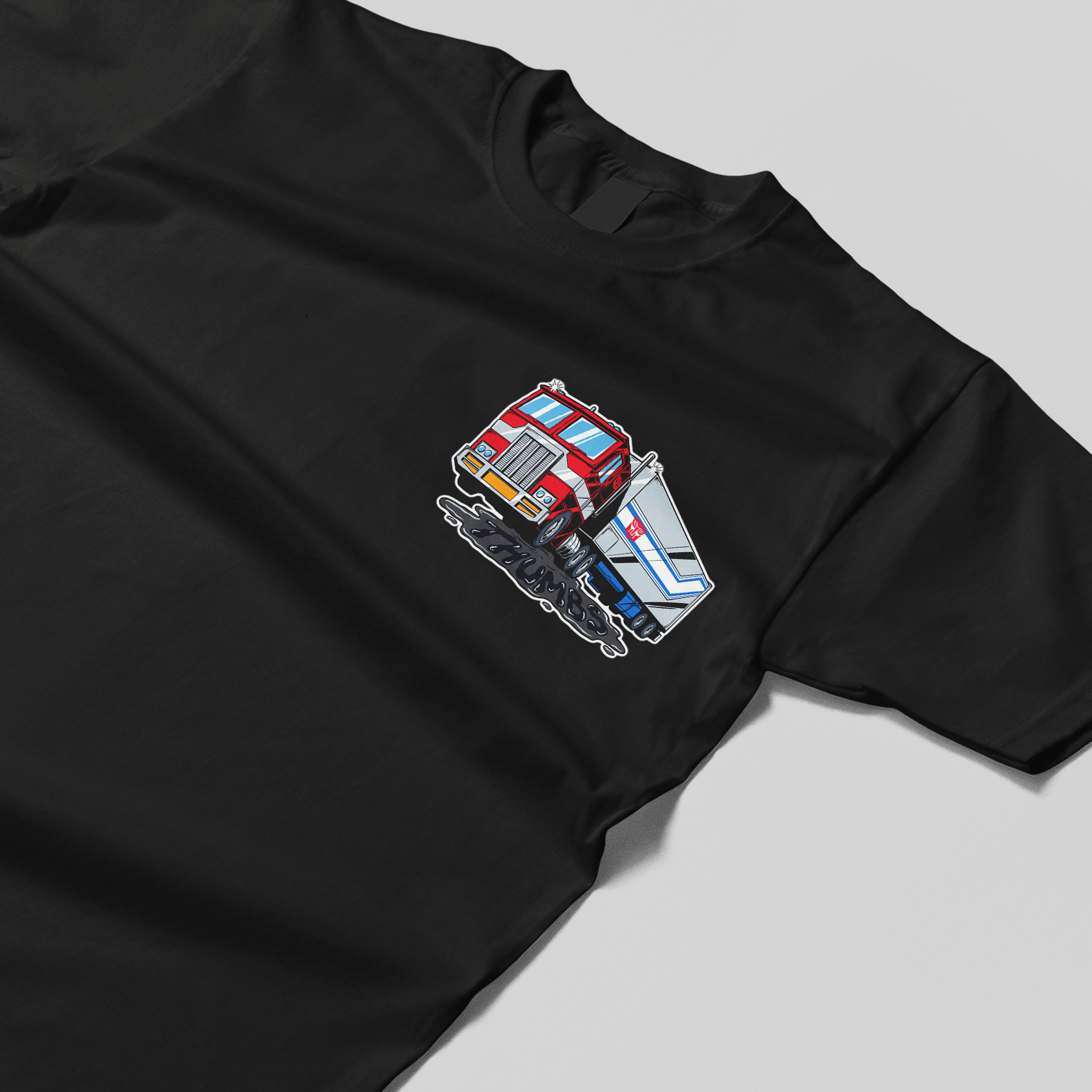 Transformers x Thumbs Optimus Prime Oil Spill T-Shirt in Black