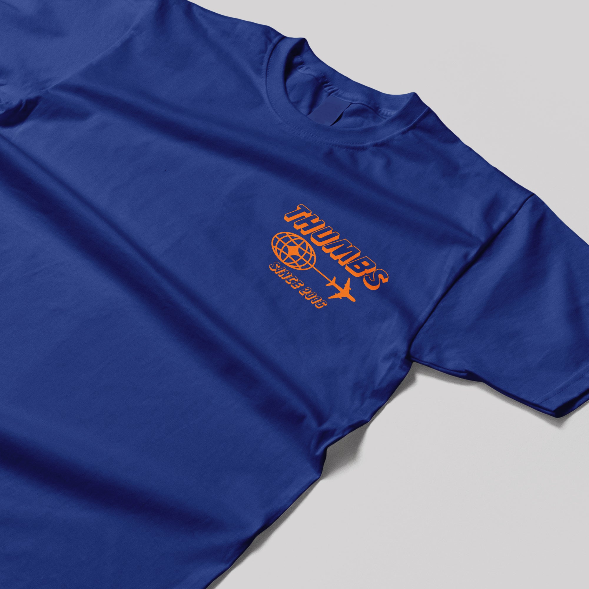 Thumbs Worldwide T-Shirt in Worker Blue